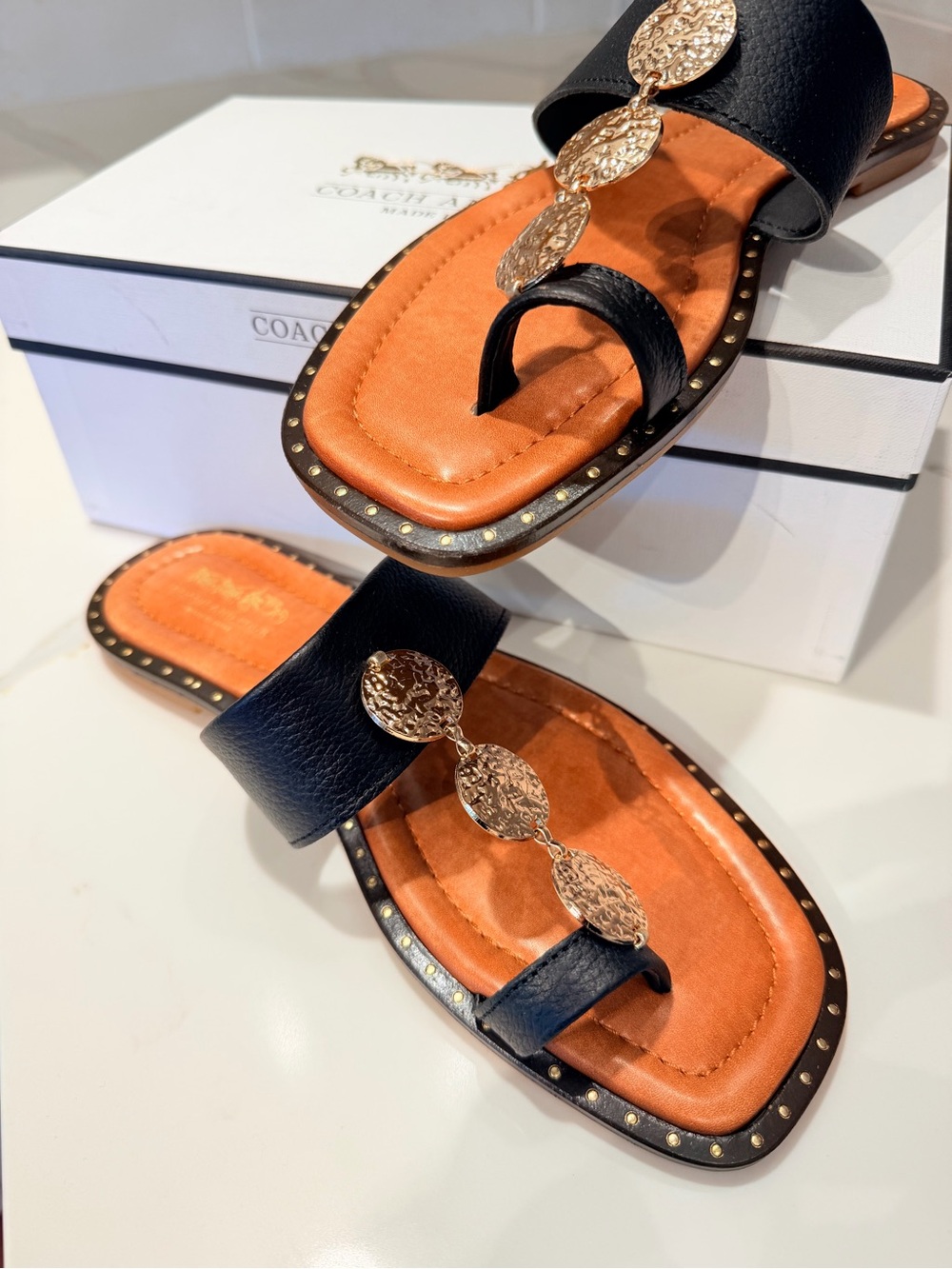 Coach and Four Black and Tan Leather Slide Sandals with Gold Accents - Picture 3 of 15